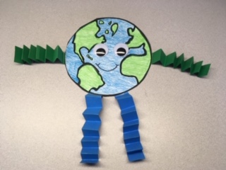 plant earth body with wiggle eyes, green arms and blue legs