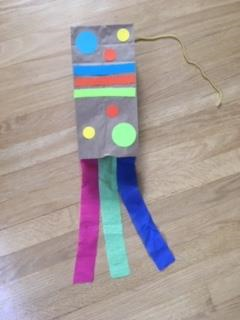 paper bag kite with colorful paper streamers