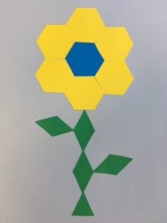 geometric flower, yellow and blue hexagons, green triangles