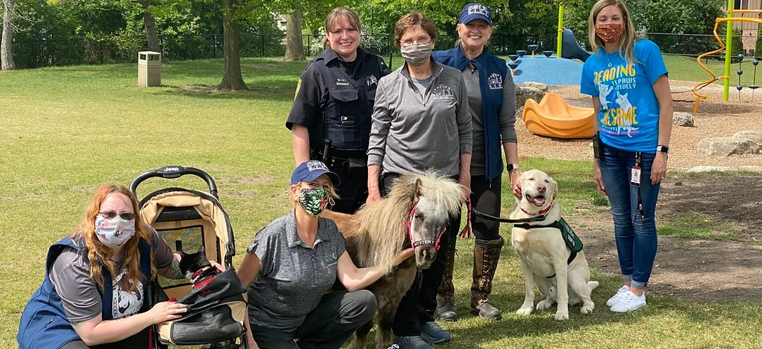 The SOUL Harbour Ranch team with a therapy dog and mini therapy horse.