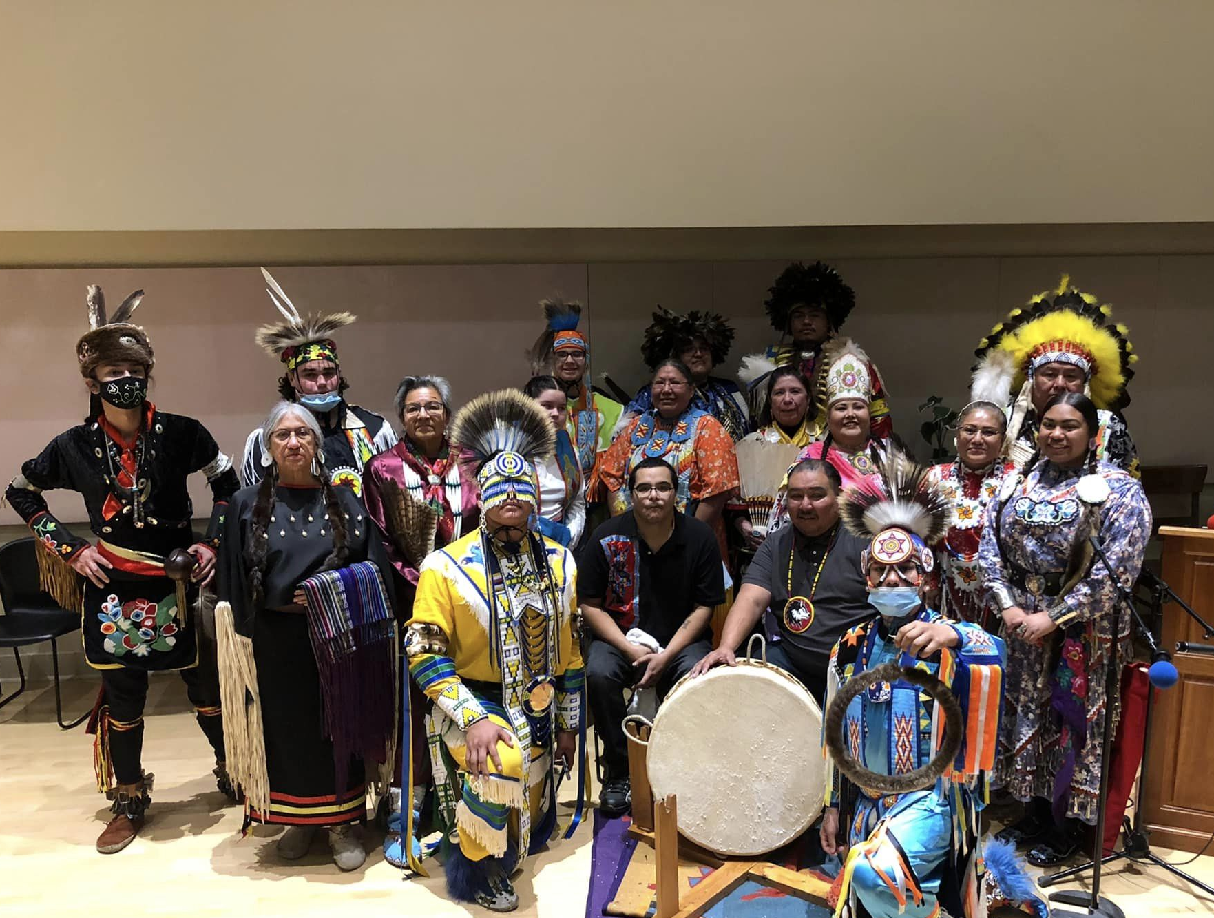 The Black Hawk Performance Company dressed in traditional indigenous attire.