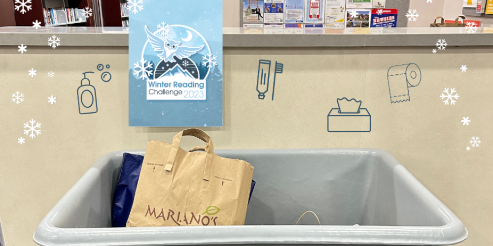 Winter Reading Challenge logo and donation bin