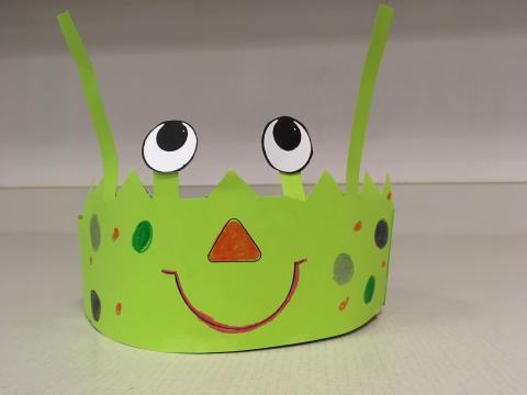 green alien headpiece
