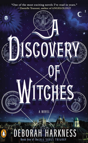 Book Cover for A Discovery of Witches. Blue background with symbols