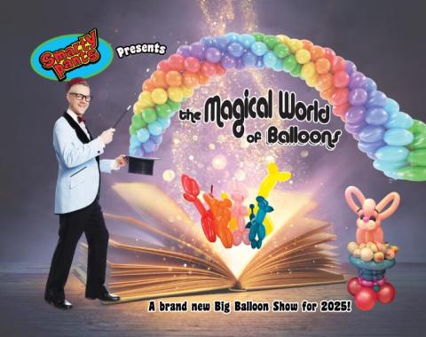 Smarty Pants holding a wand. There's a big book open with balloons coming out of the book.
