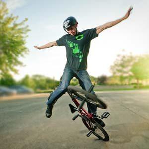 Matt Wilhelm doing a pose on his BMX bike